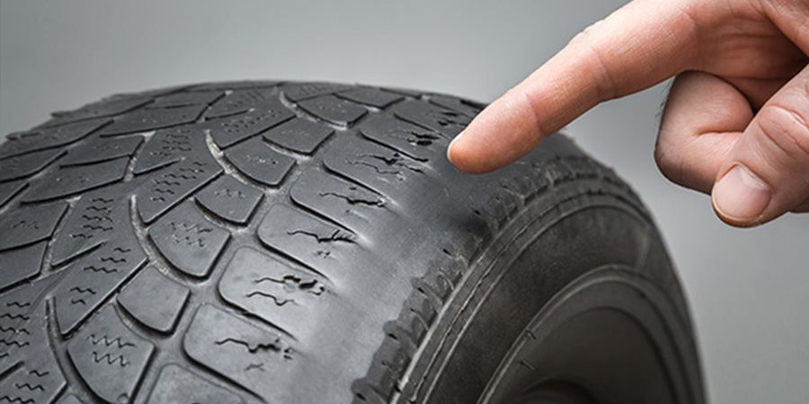 The Ultimate BMW Service & Repair Checklist - Worn Tires Image